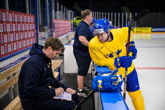 Assistant coach Stefan Klockare and Christian Folin of
