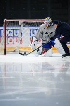 Goaltender Jesper Wallstedt and assistant coach Nicklas