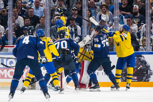 Patrik Nemeth, goaltender Lars Johansson and Lukas