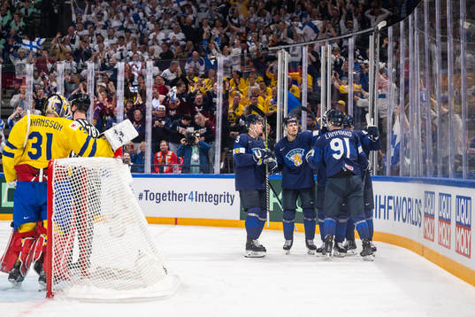 goaltender Lars Johansson of Sweden looks dejected as Juho