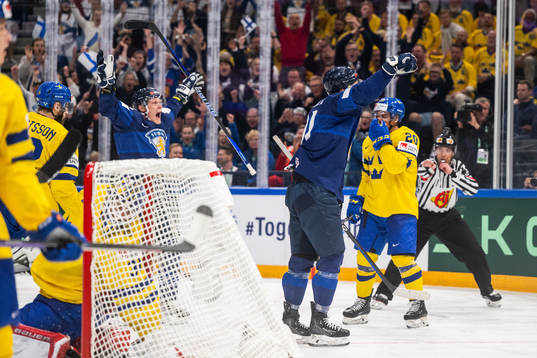 Harri Pesonen and Juho Lammikko of Finland celebrate