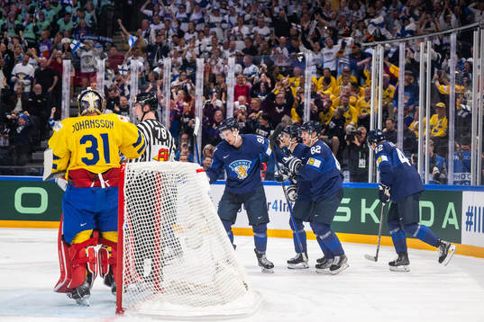 goaltender Lars Johansson of Sweden looks dejected as Juho