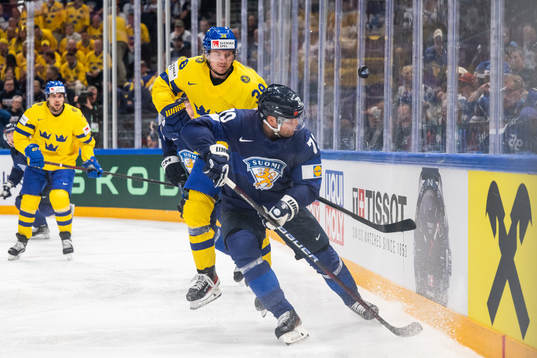 Rasmus Sandin of Sweden and Teemu Hartikainen of Finland