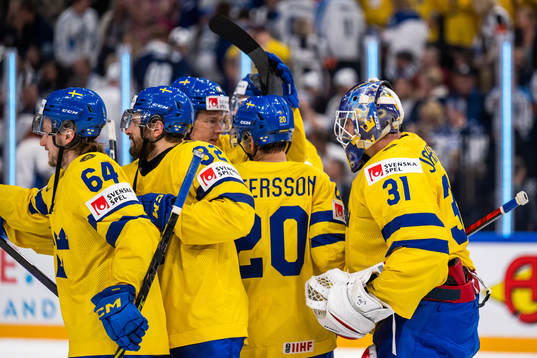 goaltender Lars Johansson of Sweden celebrates with team
