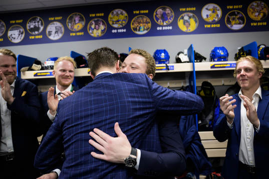 Goaltender Jesper Wallstedt and Lucas Raymond of Sweden