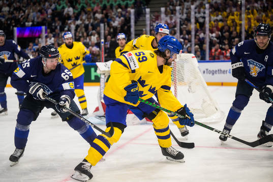 Linus Johansson of Sweden is being challenged by Sakari