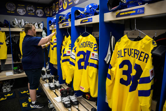 Equipment manager Frederik Andersen of Sweden hangs jerseys