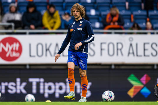 Alexander Munksgaard of Aalesund warms up