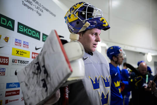 Goaltender Lars Johansson of Sweden being interviewed at a