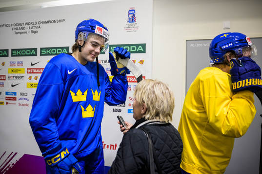 Leo Carlsson of Sweden being interviewed at a practice