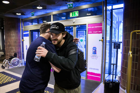 Assistant general manager Josef Boumedienne greets Timothy