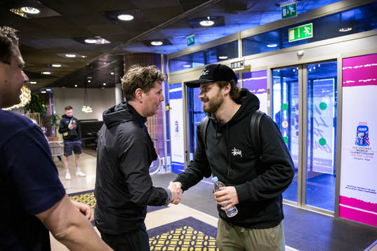 Assistant coach Stefan Klockare greets Timothy Liljegren of