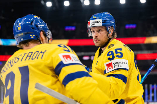 Carl Grundström and Jacob de la Rose of Sweden celebrate