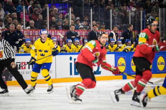The bench of Sweden with head coach Sam Hallam and