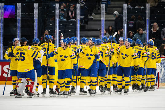 Players of Sweden celebrate