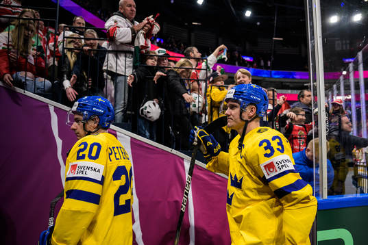 André Petersson and Jakob Silfverberg of Sweden leave the