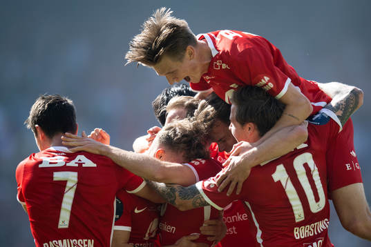 Ole Didrik Blomberg of Brann celebrates with teammates