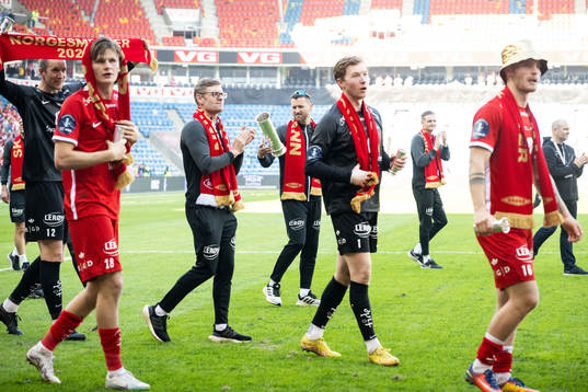 Head coach Eirik Horneland of Brann celebrates with trophy