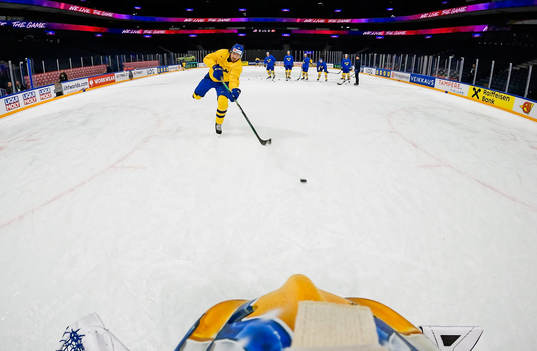 Dennis Everberg shoots at goaltender Jesper Wallstedt of