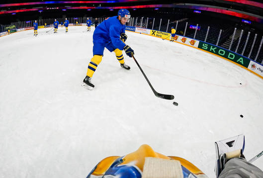 Jakob Silfverberg shoots at goaltender Jesper Wallstedt of