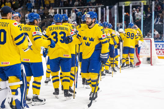 Timothy Liljegren of Sweden celebrates with teammates