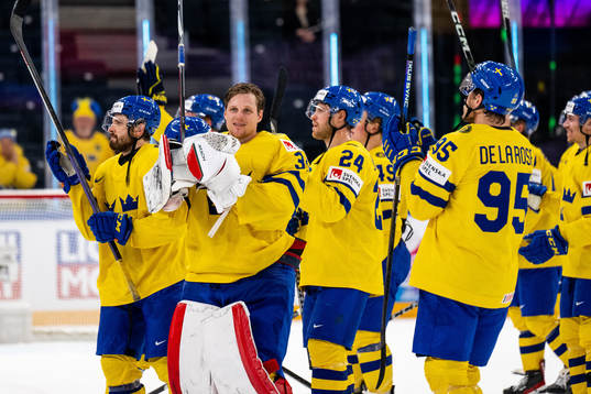 Goaltender Lars Johansson and teammates of Sweden