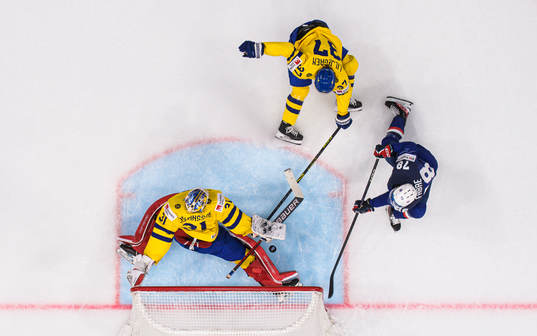 Goaltender Lars Johansson and Timothy Liljegren of Sweden