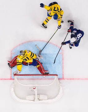 Goaltender Lars Johansson and Timothy Liljegren of Sweden