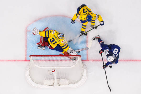 Goaltender Lars Johansson and Timothy Liljegren of Sweden