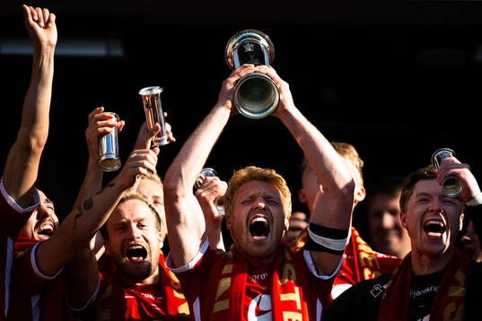 Sivert Heltne Nilsen of Brann celebrates with the trophy