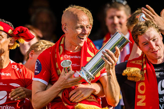 Ruben Kristiansen of Brann celebrates with the trophy