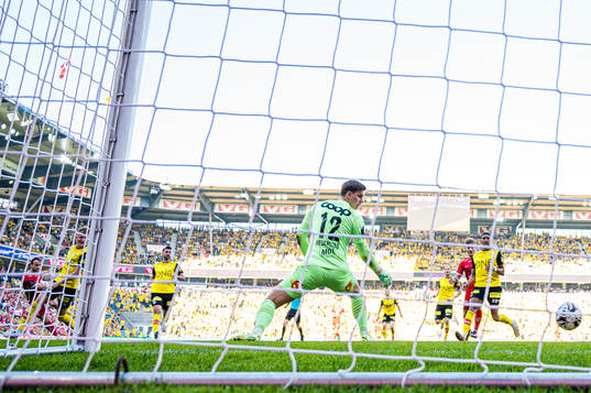 Bård Finne of Brann scores the 2-0 goal behind Mads