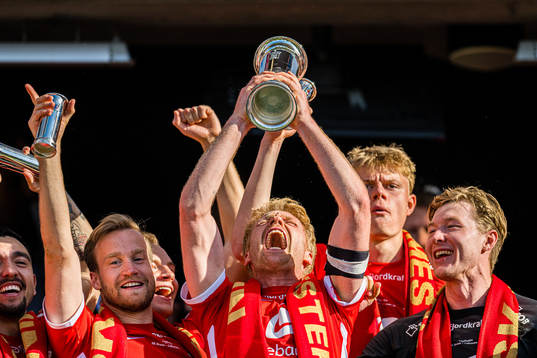 Sivert Heltne Nilsen of Brann celebrates with the trophy