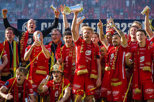 Sivert Heltne Nilsen of Brann celebrates with the trophy