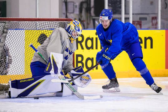 Goaltender Jesper Wallstedt and Leo Carlsson of Sweden at a