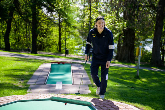Leo Carlsson of Sweden plays minigolf