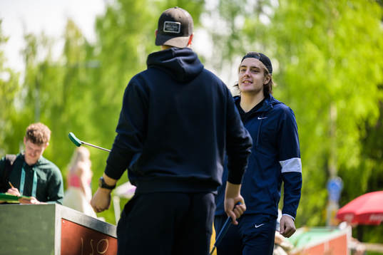 Goaltender Jesper Wallstedt and Leo Carlsson of Sweden play
