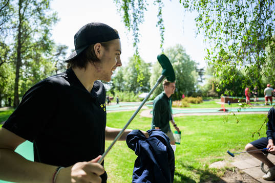 Leo Carlsson of Sweden plays minigolf