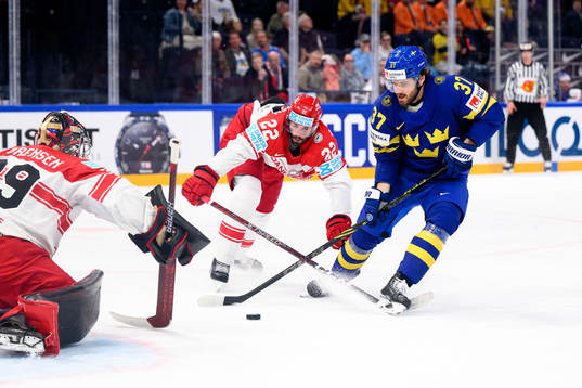 Goaltender George Sørensen and Markus Lauridsen of Denmark