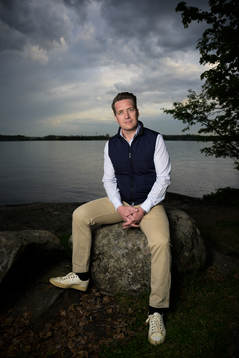Sam Hallam, head coach of team Sweden, poses for a portrait