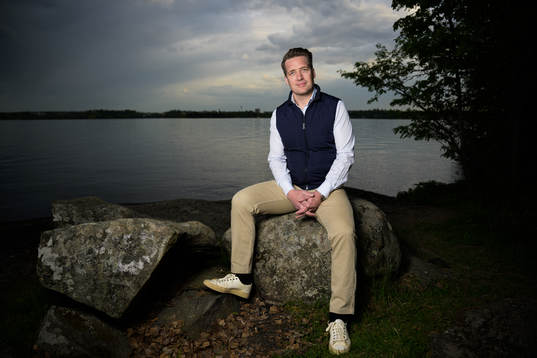 Sam Hallam, head coach of team Sweden, poses for a portrait
