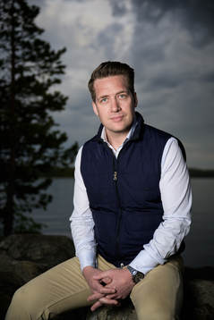 Sam Hallam, head coach of team Sweden, poses for a portrait