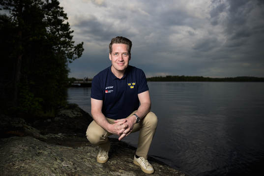 Sam Hallam, head coach of team Sweden, poses for a portrait