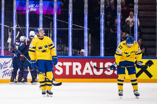 Pär Lindholm and Timothy Liljegren of Sweden look dejected