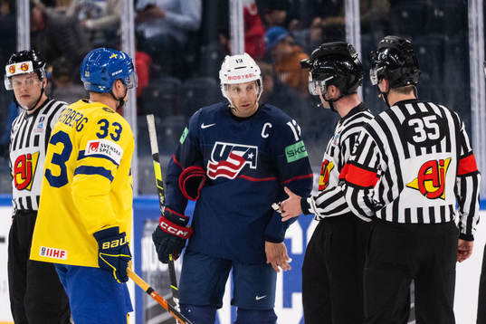 Jakob Silfverberg of Sweden and Nick Bonino of USA talks to