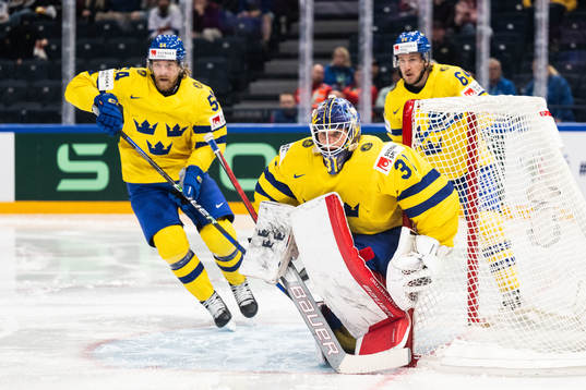 Anton Lindholm, goaltender Lars Johansson and Jonathan