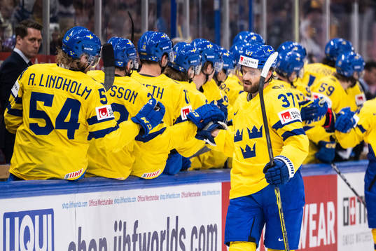 Timothy Liljegren of Sweden celebrates with team mates