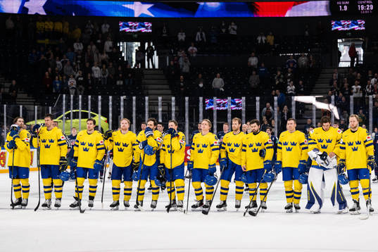 Players of Sweden look dejected