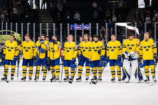 Players of Sweden look dejected
