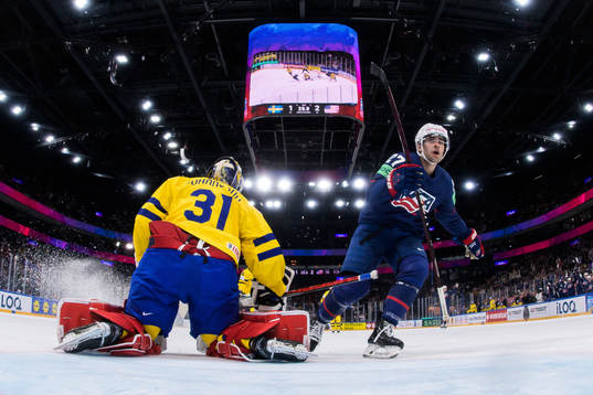 Goaltender Lars Johansson of Sweden looks dejected while